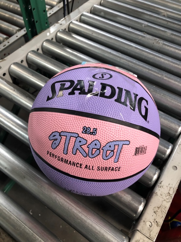 Photo 2 of * small leak * needs basketball repair kit * 
Spalding Street Outdoor Basketball Intermediate Size 6, 28.5" Pink/Purple
