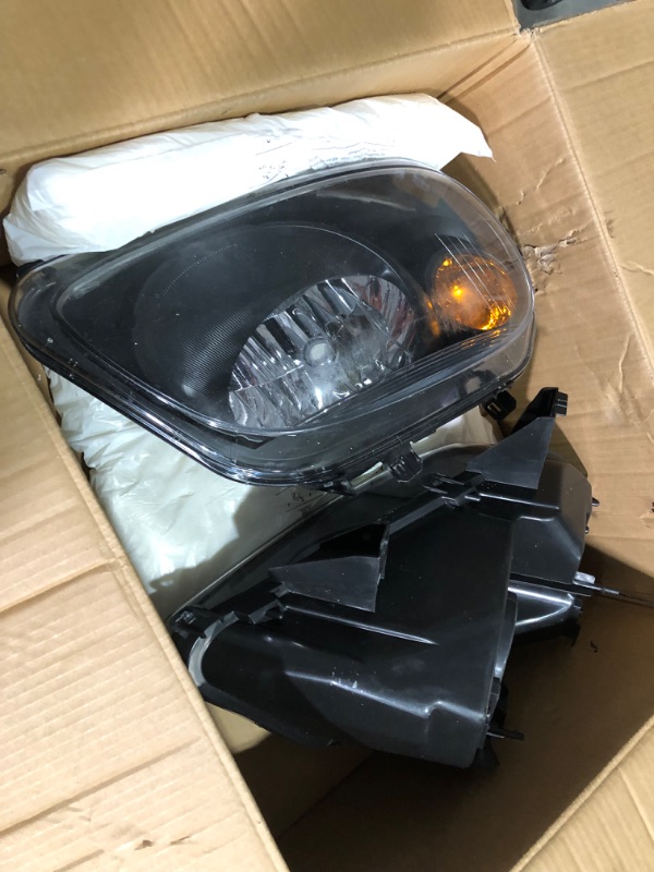 Photo 5 of ***DAMAGED - ONE OF THE HEADLIGHTS IS CRACKED - UNABLE TO TEST***
PHILTOP Headlight Assembly, Black Headlights Replacement Compatible with 2006-2011 HHR Amber Reflector Clear Lens Color