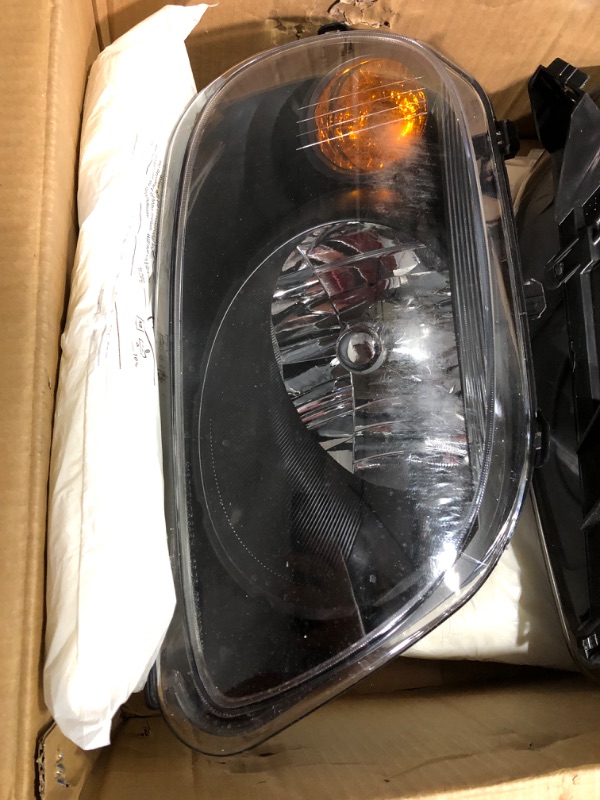 Photo 4 of ***DAMAGED - ONE OF THE HEADLIGHTS IS CRACKED - UNABLE TO TEST***
PHILTOP Headlight Assembly, Black Headlights Replacement Compatible with 2006-2011 HHR Amber Reflector Clear Lens Color