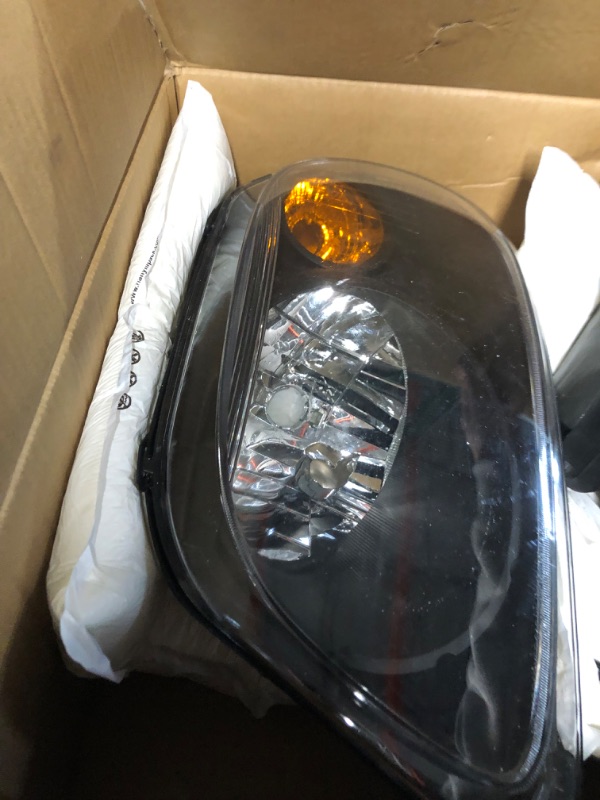 Photo 2 of ***DAMAGED - ONE OF THE HEADLIGHTS IS CRACKED - UNABLE TO TEST***
PHILTOP Headlight Assembly, Black Headlights Replacement Compatible with 2006-2011 HHR Amber Reflector Clear Lens Color