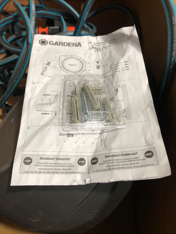 Photo 6 of ***BROKEN AND MISSING PIECES - NONFUNCTIONAL - FOR PARTS ONLY - NONREFUNDABLE***
GARDENA 8040 50 Foot Wall Mounted Retractable Reel with Hose Guide, ft, Grey Wall-Mounted - Grey Hose Reel 50 ft