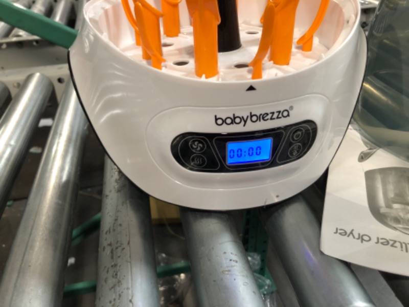 Photo 1 of Baby Brezza Baby Bottle Sterilizer and Dryer Machine – Electric Steam Sterilization - Universal Fit - Pacifiers, Glass, Plastic, and Newborn Feeding Bottles