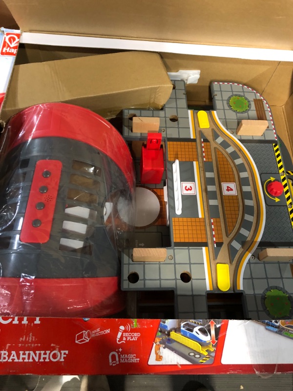 Photo 4 of ***USED - MISSING PARTS - DAMAGED***
Hape Grand City Station with Light and Sound| 49 PCs Wooden Pretend Play Railway Set with Projector and Recorder for Kids