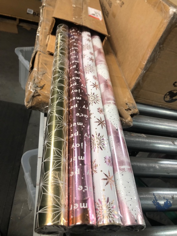 Photo 1 of American Greetings 80 sq. ft. Gold & Pink Christmas Wrapping Paper Bundle (Stars) (4 Rolls 30 in. x 8 ft.) 