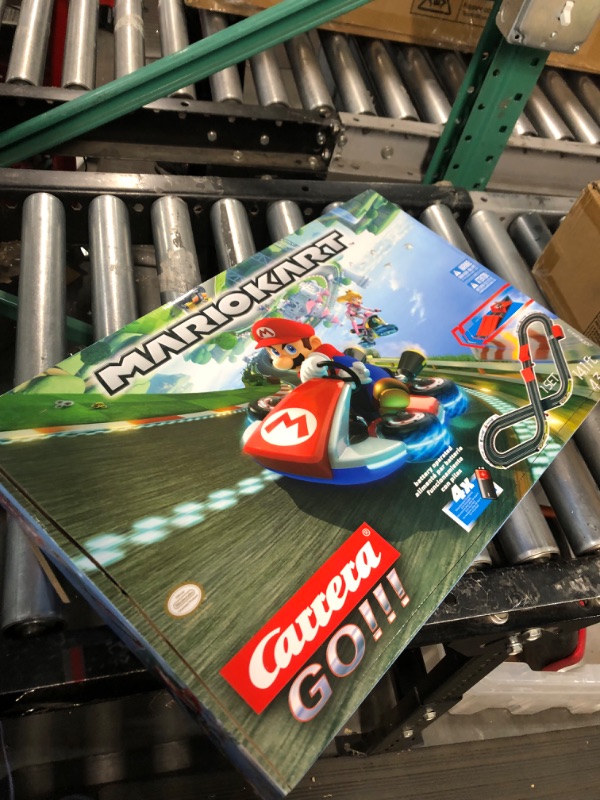 Photo 4 of Carrera GO!!! 63503 Official Licensed Mario Kart Battery Operated 1:43 Scale Slot Car Racing Toy Track Set with Jump Ramp Featuring Mario and Luigi for Kids Ages 5 Years and Up