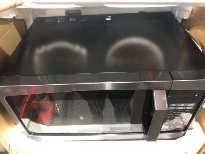 Photo 2 of ***USED - POWERS ON - UNABLE TO TEST FURTHER***
TOSHIBA EM925A5A-BS Countertop Microwave Oven, 0.9 Cu Ft With 10.6 Inch Removable Turntable, Black Stainless Steel