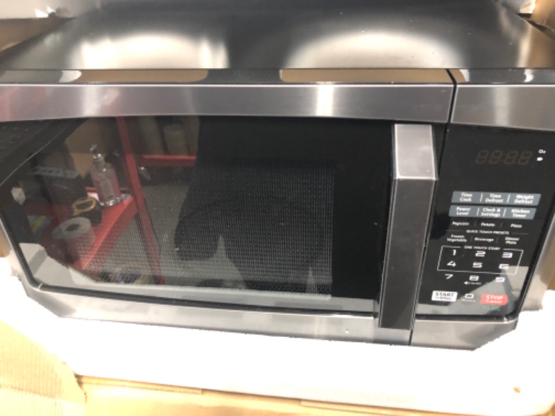 Photo 3 of ***USED - POWERS ON - UNABLE TO TEST FURTHER***
TOSHIBA EM925A5A-BS Countertop Microwave Oven, 0.9 Cu Ft With 10.6 Inch Removable Turntable, Black Stainless Steel