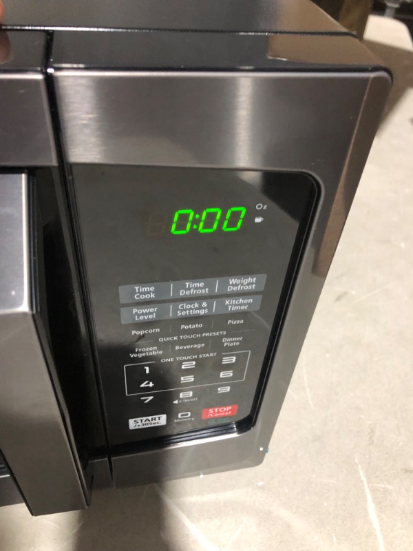 Photo 7 of ***USED - POWERS ON - UNABLE TO TEST FURTHER***
TOSHIBA EM925A5A-BS Countertop Microwave Oven, 0.9 Cu Ft With 10.6 Inch Removable Turntable, Black Stainless Steel