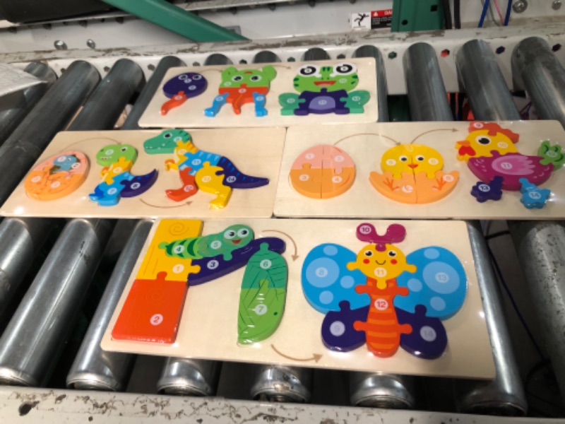 Photo 1 of 4 Pack Wooden Puzzles