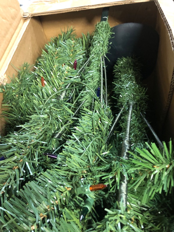 Photo 1 of National Tree Company Pre-Lit Artificial Medium Christmas Tree, Green, Kincaid Spruce, Multicolor Lights, Includes Stand, 6 Feet 6 ft