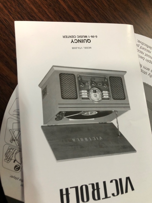 Photo 5 of **NONREFUNDABLE**FOR PARTS OR REPAIR**SEE NOTES**
Victrola Nostalgic 6-in-1 Bluetooth Record Player & Multimedia Center with Built-in Speakers - 3-Speed Turntable, CD & Cassette Player, AM/FM Radio | Wireless Music Streaming | Espresso Espresso Entertainm