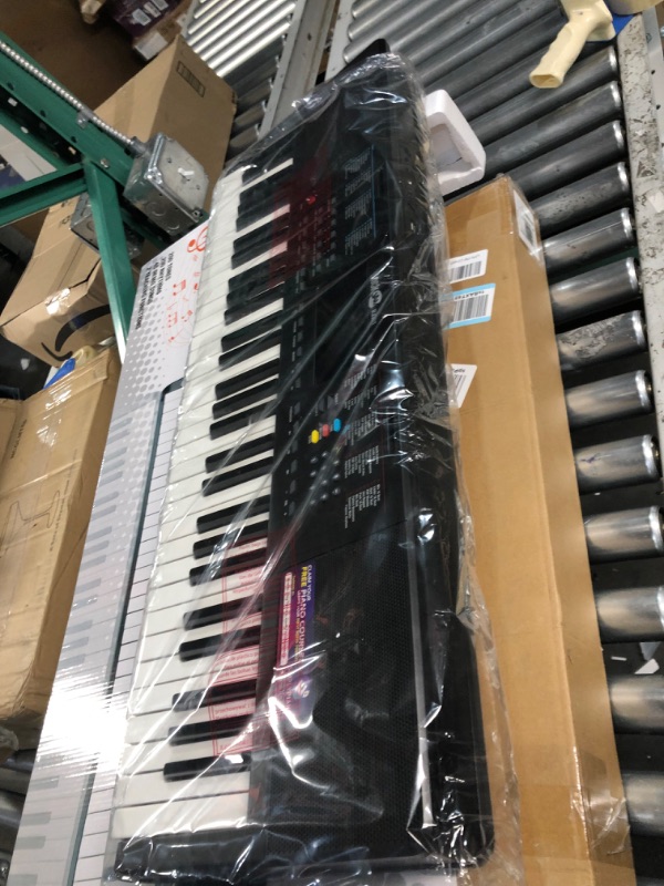 Photo 3 of **SEE NOTES**
RockJam Compact 61 Key Keyboard with Sheet Music Stand, Power Supply, Piano Note Stickers & Simply Piano Lessons
