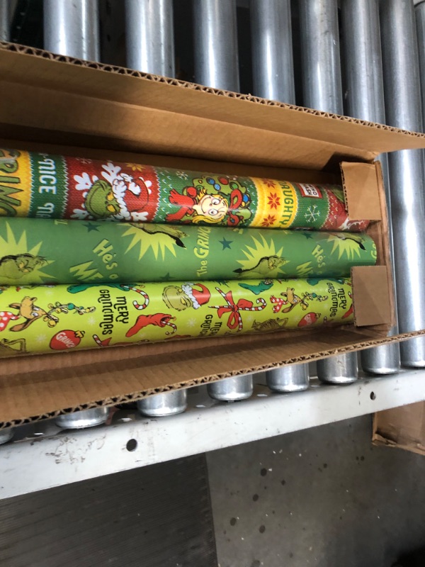 Photo 4 of American Greetings Christmas Wrapping Paper with Cut Lines Bundle, The Grinch (3 Rolls, 105 sq. ft.)