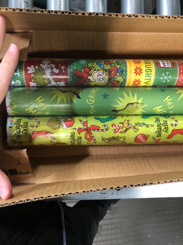 Photo 3 of American Greetings Christmas Wrapping Paper with Cut Lines Bundle, The Grinch (3 Rolls, 105 sq. ft.)