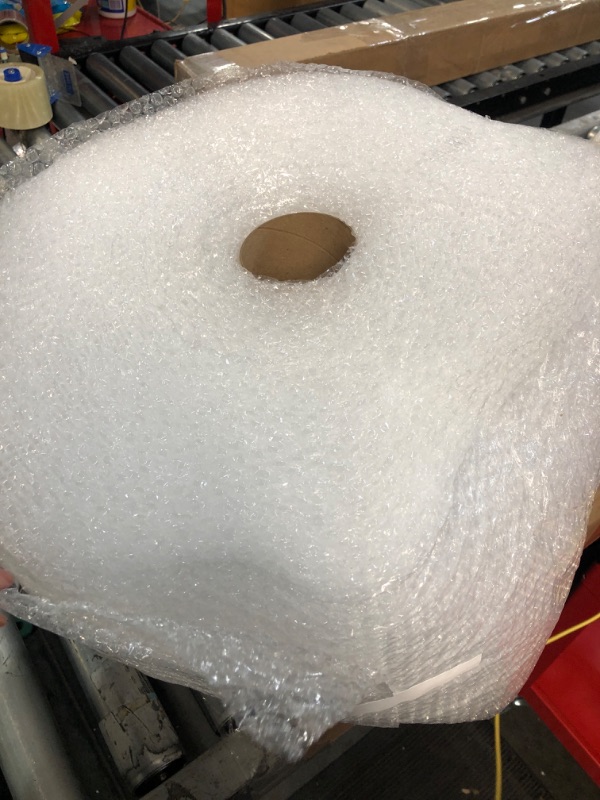 Photo 1 of Amazon Basics Perforated Bubble Cushioning Wrap - Small 3/16", 12-Inch x 175-Foot Long Roll- Large