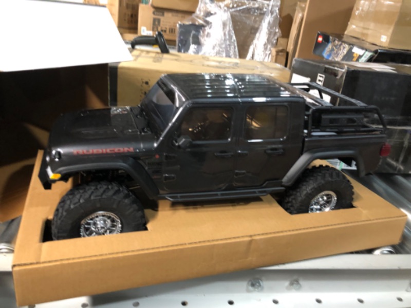 Photo 2 of Axial RC Truck 1/10 SCX10 III Jeep JT Gladiator Rock Crawler with Portals RTR (Batteries and Charger Not Included), Gray, AXI03006BT1 Grey