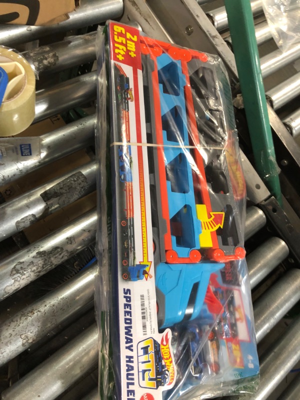 Photo 4 of ?Hot Wheels Speedway Hauler Storage Carrier with 3 1:64 Scale Cars & Convertible 6-Foot Drag Race Track for Kids 4 to 8 Years Old, Stores 20+ Cars & Connects to Other Hot Wheels City Sets & Tracks Single