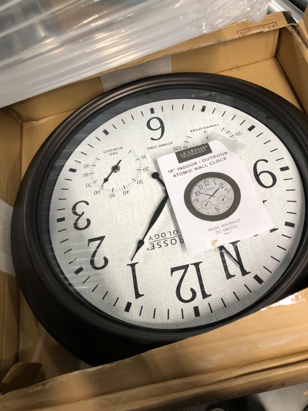 Photo 1 of **DOES NOT WOKR**NON-FUNCTIONAL**
La Crosse Technology 404-89027-INT 18-inch Indoor/Outdoor Brown Atomic Analog Wall Clock