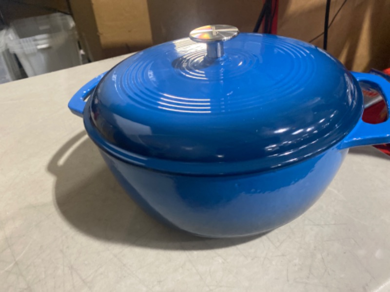 Photo 3 of **Enamel Chipped**
AmazonBasics Enameled Cast Iron Covered Dutch Oven, 6-Quart, Blue