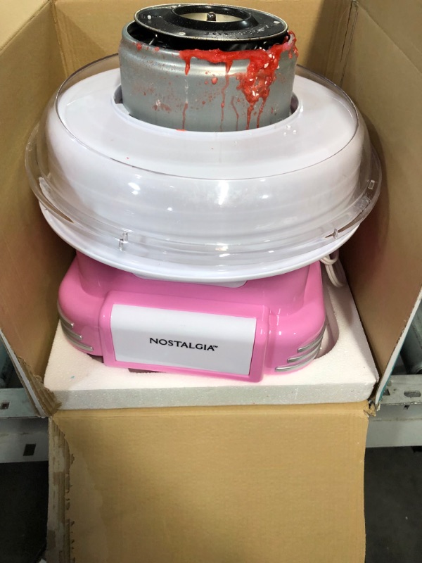 Photo 1 of Nostalgia Cotton Candy Machine - Retro Cotton Candy Machine for Kids with 2 Reusable Cones, 1 Sugar Scoop, and 1 Extractor Head – Pink