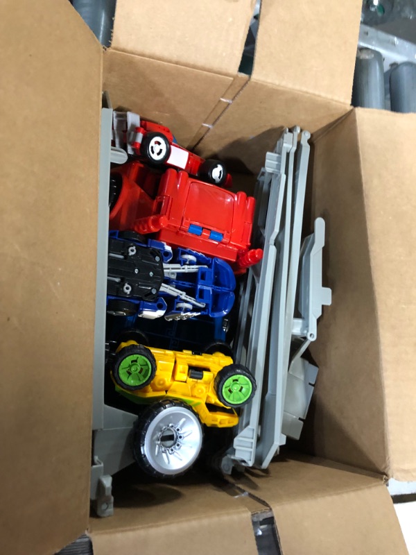 Photo 3 of Transformers Playskool Heroes Rescue Bots Academy Road Rescue Team Trailer 4-Pack Converting Toy Robots Collectible Action Figures, Kids Ages 3 and Up (Amazon Exclusive)