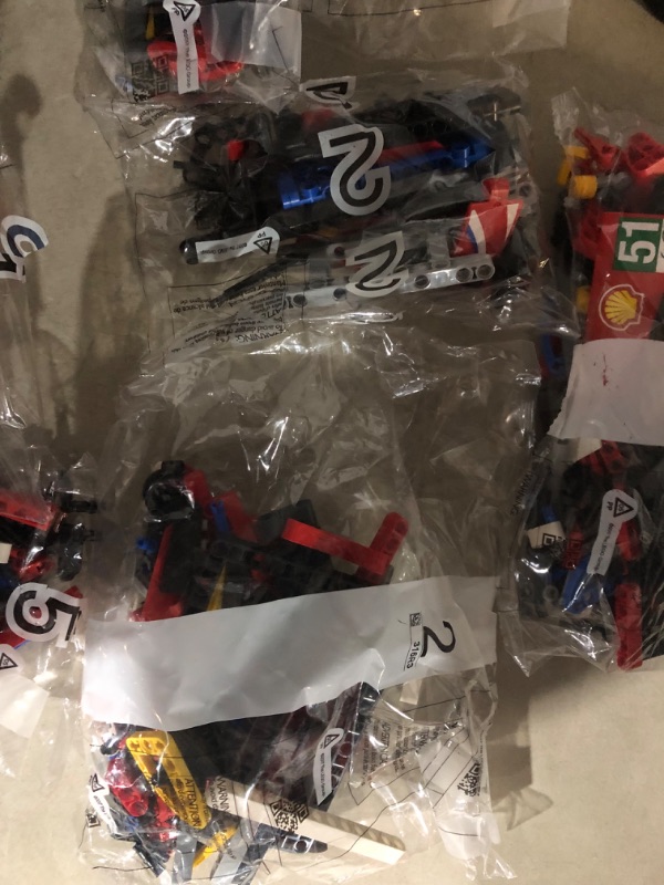 Photo 3 of **ALL BAGS OPEN.*LOOSE PIECES*POSSIBLE MISSING PIECES***
LEGO Technic Ferrari 488 GTE “AF Corse #51” 42125 Building Set for Adults (1,684 Pieces)