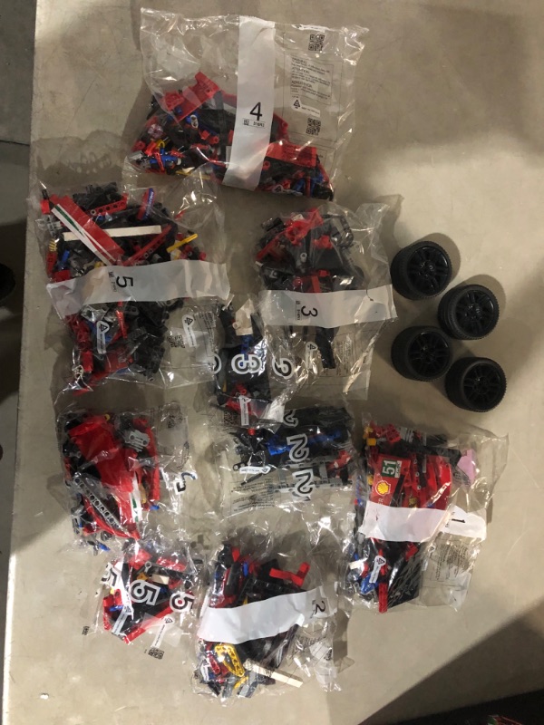 Photo 7 of **ALL BAGS OPEN.*LOOSE PIECES*POSSIBLE MISSING PIECES***
LEGO Technic Ferrari 488 GTE “AF Corse #51” 42125 Building Set for Adults (1,684 Pieces)