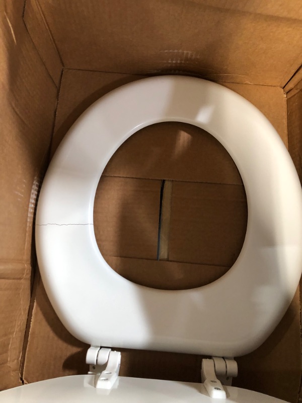 Photo 2 of **MAJOR CRACK FIXABLE**
BEMIS 400TTA 000 Economy Toilet Seat, Durable Enameled Wood, ROUND, 