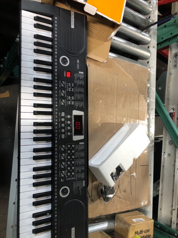 Photo 2 of **NOTES**61 Key Keyboard Piano, Electric Piano Music Keyboard with Teaching Mode, Microphone, Sheet Music Stand and Power Supply, portable keyboard piano for Beginners