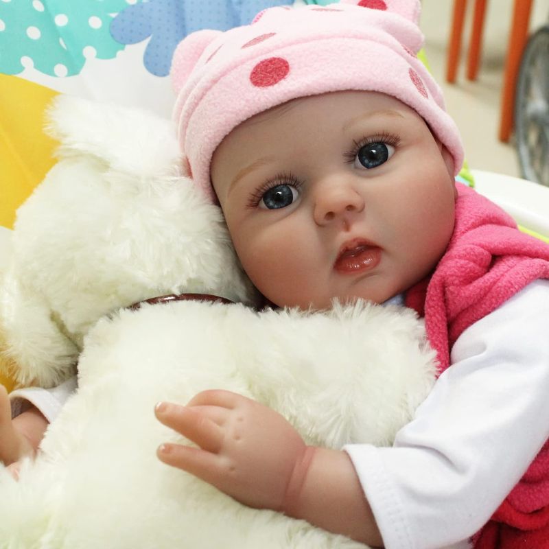 Photo 4 of CHAREX Reborn Baby Dolls - 22 inches Realistic Newborn Soft Vinyl Baby Dolls Toy for Kids Age 3+