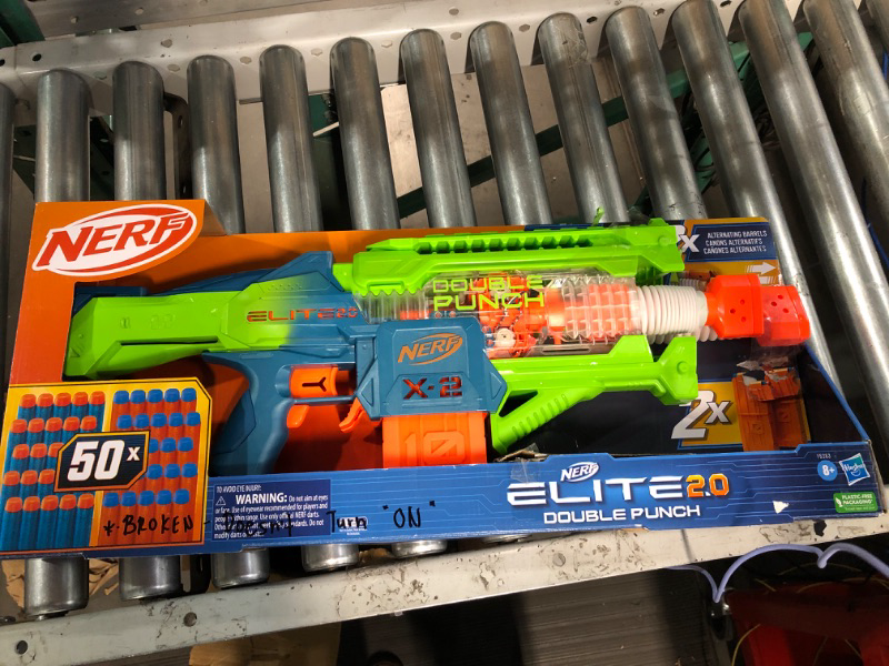 Photo 2 of **DAMAGE**
Nerf Elite 2.0 Double Punch Motorized Dart Blaster, Rapid Alternating Barrels, 50 Nerf Elite Darts, 2X 10-Dart Clips, Ages 8 & Up