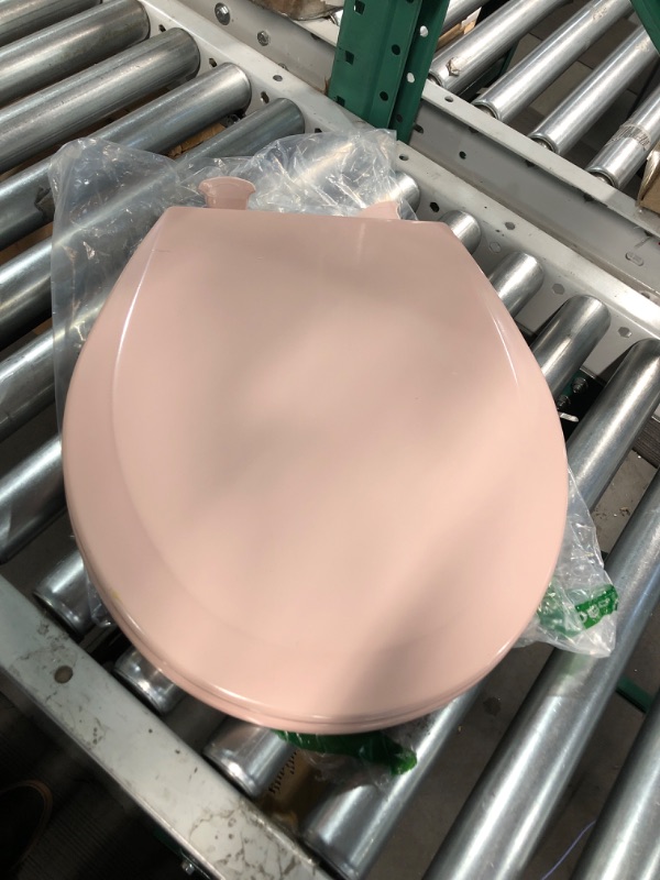 Photo 4 of **MINOR DAMAGE**
Bemis 500EC 063 Toilet Seat with Easy Clean & Change Hinges, Round, Durable Enameled Wood, Venetian Pink Venetian Pink Round