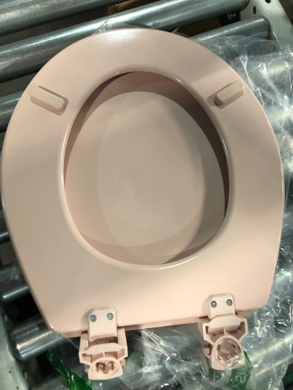 Photo 6 of **MINOR DAMAGE**
Bemis 500EC 063 Toilet Seat with Easy Clean & Change Hinges, Round, Durable Enameled Wood, Venetian Pink Venetian Pink Round