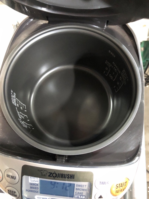 Photo 1 of **DAMAGE**
Zojirushi NS-TSC10 5-1/2-Cup (Uncooked) Micom Rice Cooker and Warmer, 1.0-Liter 5.5 cups Rice Cooker