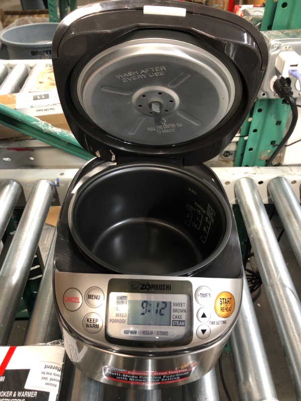 Photo 1 of **DAMAGE**
Zojirushi NS-TSC10 5-1/2-Cup (Uncooked) Micom Rice Cooker and Warmer, 1.0-Liter 5.5 cups Rice Cooker