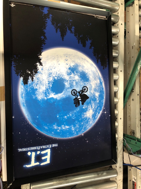 Photo 2 of **DAMAGE**
Trends International E.T. The Extra-Terrestrial Wall Poster, Black Framed Version 22.375" x 34" 