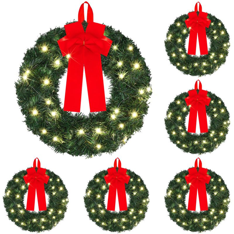 Photo 1 of ***USED - NO BATTERIES - UNABLE TO TEST - ONLY 2 WREATHS***
Yuxung 2 Pcs 14 Inch Pre Lit Christmas Wreath with Lights Mini Artificial LED Christmas Front Door Wreath with Red Bow for Xmas Holiday Party Decorations Table Fireplaces Porch Wall Ornament