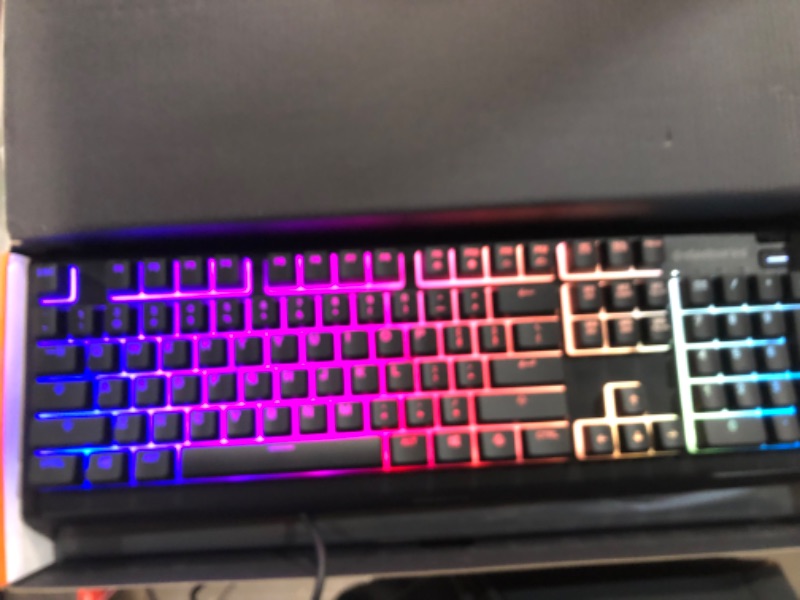 Photo 3 of SteelSeries Apex 3 RGB Gaming Keyboard – 10-Zone RGB Illumination – IP32 Water Resistant – Premium Magnetic Wrist Rest (Whisper Quiet Gaming Switch)