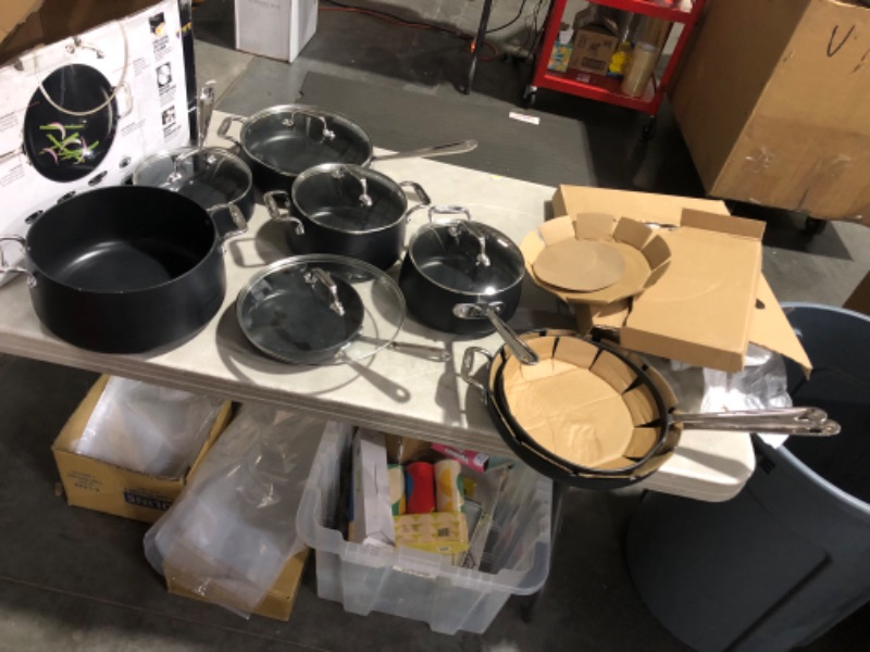 Photo 2 of ***DAMAGED - BENT - SEE PICTURES***
All-Clad HA1 Hard Anodized Nonstick Cookware Set, Pots and Pans Set, 13 Piece, Black