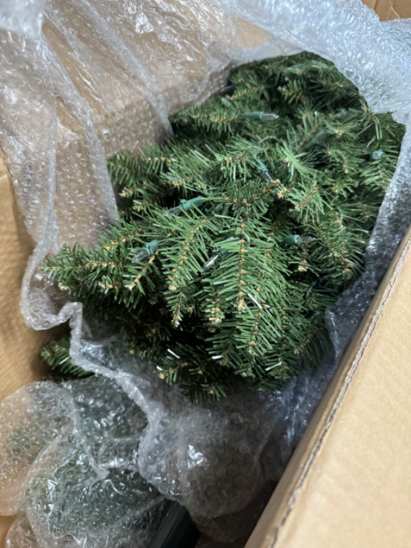 Photo 1 of ***LIGHTS ON TOP PART DON'T WORK***
Puleo International 7.5' Pre-Lit Fraser Fir Pencil Tree Artificial Christmas Tree with 350 Clear UL Listed Lights