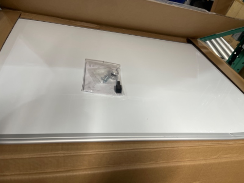 Photo 1 of Amazon Basics Magnetic Dry Erase White Board, 36 x 24-Inch Whiteboard - Silver Aluminum Frame 24" x 36" Magnetic, Aluminum Frame