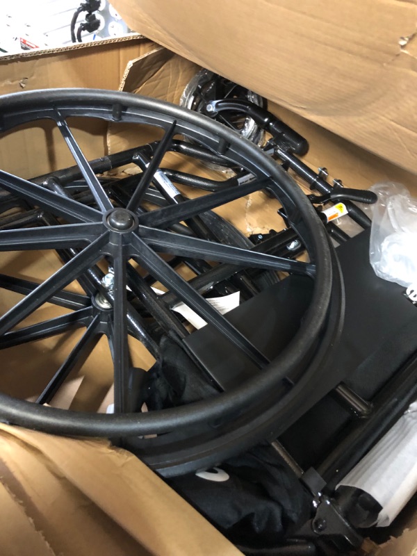 Photo 5 of ***MISSING PARTS - SEE COMMENTS***
Drive Medical SSP118FA-SF Silver Sport 1 Folding Transport Wheelchair with Full Arms and Removable Swing-Away Footrest, Black