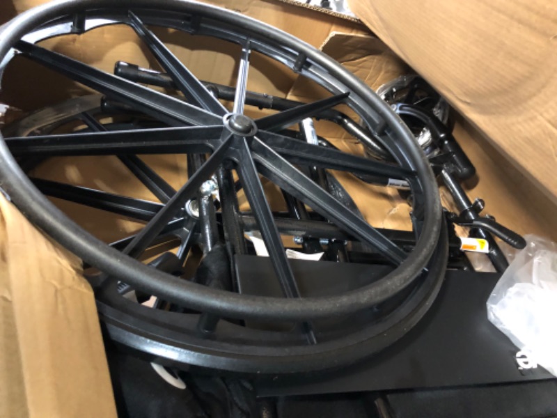 Photo 3 of ***MISSING PARTS - SEE COMMENTS***
Drive Medical SSP118FA-SF Silver Sport 1 Folding Transport Wheelchair with Full Arms and Removable Swing-Away Footrest, Black