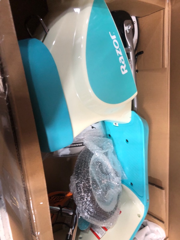 Photo 1 of Razor Pocket Mod Petite - 12V Miniature Euro-Style Electric Scooter for Ages 7+, 100-watt Motor, Up to 40 min Ride Time, For Riders up to 110 lbs