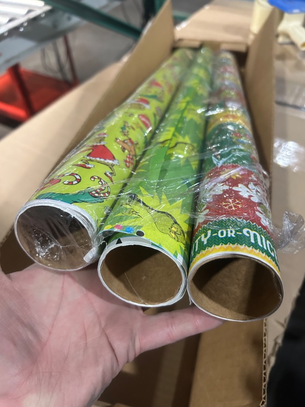 Photo 3 of American Greetings Christmas Wrapping Paper with Cut Lines Bundle, The Grinch (3 Rolls, 105 sq. ft.)