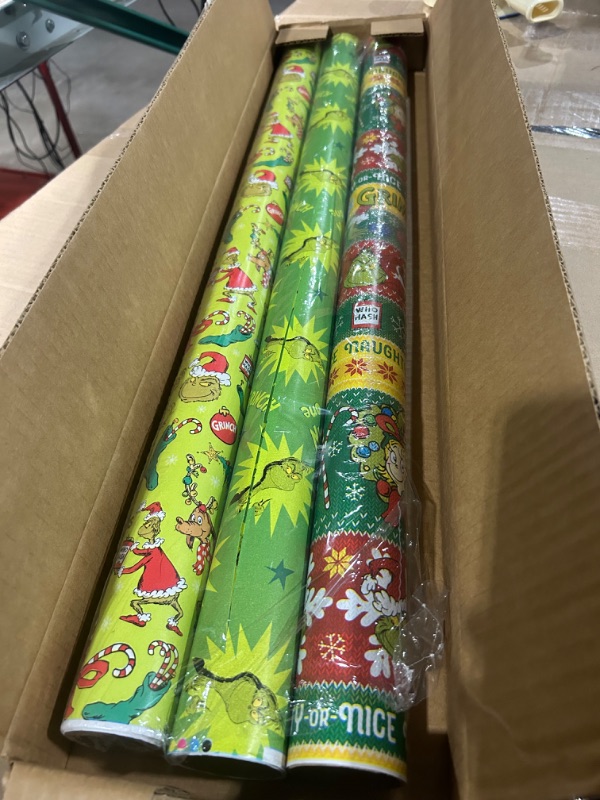 Photo 2 of American Greetings Christmas Wrapping Paper with Cut Lines Bundle, The Grinch (3 Rolls, 105 sq. ft.)