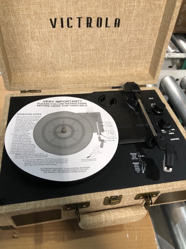 Photo 4 of Victrola Journey+ Signature Turntable Record Player - 33-1/3, 45 & 78 RPM Suitcase Vinyl Record Player, Bluetooth Connectivity & Built-in Speakers, Stereo RCA Output, Linen Finish, Cream