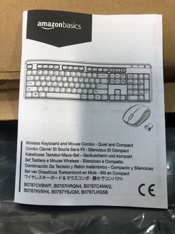 Photo 2 of Amazon Basics Wireless Computer Keyboard and Mouse Combo - Quiet and Compact - US Layout (QWERTY)