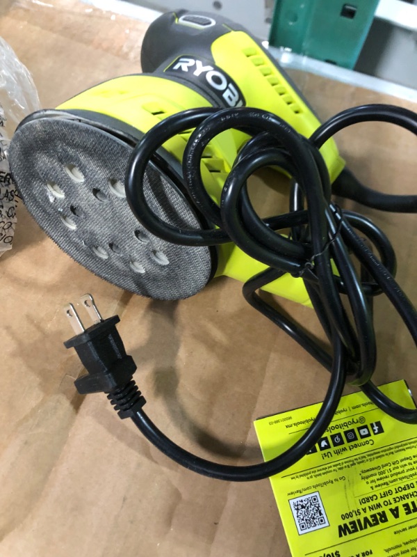 Photo 5 of Ryobi RS290G 2.6 Amp 12,500 OPM Single Speed 5 Inch Hook and Loop Corded Random Orbit Sander w/ 3 Pads and Dust Bag