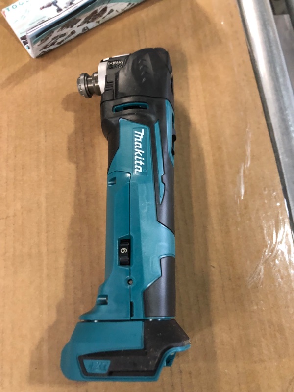 Photo 2 of Makita XMT03Z 18V LXT® Lithium-Ion Cordless Multi-Tool, Tool Only